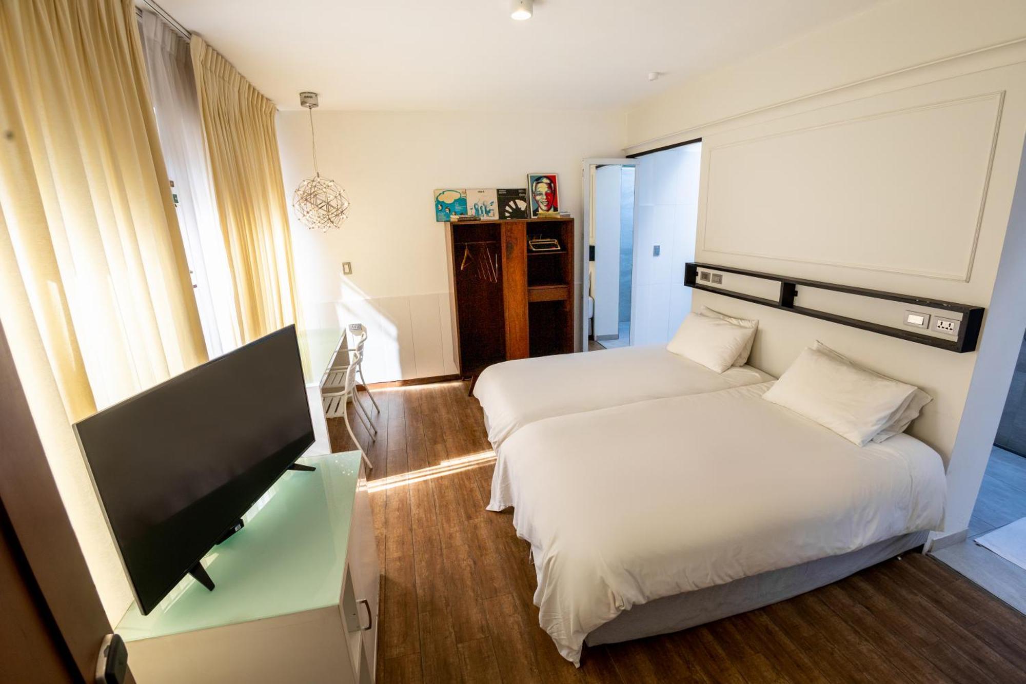 Cosmopolitano Hotel Boutique Santa Cruz de La Sierra Eksteriør bilde A room at the hotel